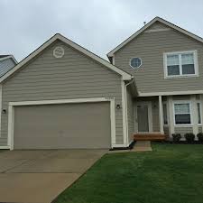 Check spelling or type a new query. Benjamin Moore Indian River On The Siding Garage And Front Door Is Trimmed In White Sand Sand Paint Color Wall Paint Colors Front Door