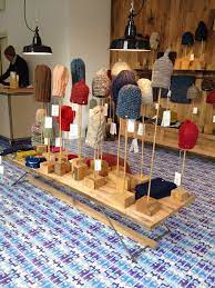 One Bunting Away Het Zwarte Schaap Knit Hats Store In Amsterdam Hat Display Ideas Craft Show Displays Hat Display