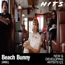 Our Q1 N&D coverage continues with Beach Bunny (AWAL) Beach Bunny, the  Chicago-based indie rock trio of Lili Trifilio, Jonathan Alvarado and  Anthony Vaccaro, has been crafting heartfelt, punk-inspired anthems since  the