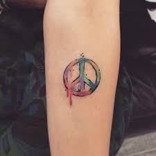 30 Cool Peace Sign Tattoo Meaning And Ideas Anti War Movement Symbol Peace Sign Tattoos Peace Tattoos Tattoos With Meaning