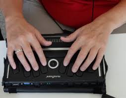 At From The National Deaf Blind Equipment Distribution Program Close Up Of Hands On A Braille Device Deaf Multiple Disabilities Blind Resources