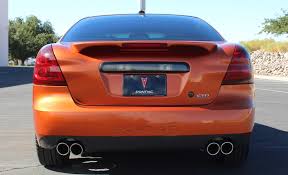 Image result for Sunburst Orange 2004 Pontiac
