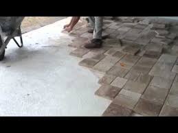 This Is How To Lay The Thin Pavers Over Concrete Great Idea To Makeover Front Stoop Concrete Patio Makeover Concrete Patio Pavers Over Concrete