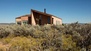 You can usually distinguish modern designs and contemporary homes by taller windows, unique shapes, along with other building highlights. New Mexico Home Takes Cues From Adobe Architecture And Desert Terrain