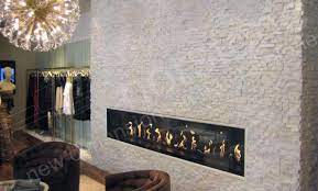 What about a very white stone fireplace? White Quartz Stacked Stone Veneer For Feature Walls