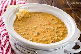 Velveeta shells and cheese cheese stuffed shells taco mac and cheese macaroni cheese velveeta recipes crockpot recipes cooking recipes easy hamburger meat recipes ground an easy appetizer recipe for cheesy sliders made with ground beef, pork sausage and velveeta. Crock Pot Cheesy Hamburger Dip Video Julie S Eats Treats