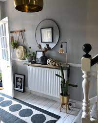 Bordering spacious picture windows, the radiator shelf gives indoor plants a chance to bask in the sun. 15 Diy Radiator Cover Ideas How To Make A Radiator Cover