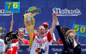 Coming in second was michelle lesco with 27 hot dogs. Sqn Rnbkusmlqm