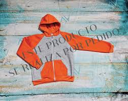 Art. 124 Campera Gris Manga Ranglan Naranja