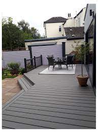 Depending on the colour of your home, the use of your space, or even just simple preference, you can choose from many shades for any aesthetic you please. Quality Composite Decking For Your Garden Grey Decking Ideas Garden Greydeckingideasgarden In 2021 Patio Garden Design Patio Deck Designs Deck Designs Backyard
