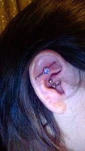 My Healed Daith And Floating Industrial Bar Done By Coyote Black With Anatometal Jewelry Daith In Cool Piercings Belly Button Piercing Jewelry Ear Piercings