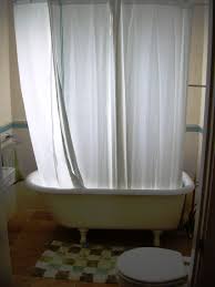 Bathroom tub shower tiny house bathroom bathroom renos bathroom ideas bathroom remodeling wainscoting bathroom bathroom designs bathroom small bath tub. Ways To Make Decorating With A Claw Foot Tub Simple Lovetoknow