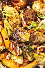 Roasted Brussels Sprouts And Sweet Potato With Balsamic Honey Glaze Brussel Sprouts And Sweet Potato Recipe Healthy Potato Recipes Roasted Brussel Sprouts