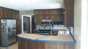 Give your kitchen a dramatic, yet sophisticated look by painting your cabinets gray. Tips For Refinishing Kitchen Cabinets This Old House