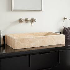 This stone sink features a honed finish, which gives it a duller, more matted look than its polished counterparts. Bathroom Travertine Sink Signature Hardware