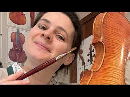 French polishing a violin