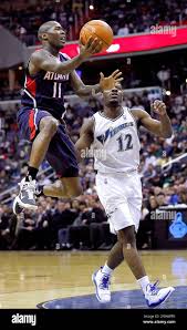 Atlanta Hawks guard Jamal Crawford (11) drives to the basket past  Washington Wizards guard Othyus Jeffers (12) during their game played at  the Verizon Center in Washington, D.C., Saturday, April 9, 2011. (