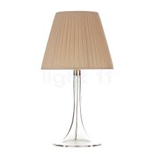 The miss k table lamp, designed by philippe starck, uses a new innovative material that appears metallic silver when off and becomes transparent when lit, exposing the opaque inner diffuser. Flos Miss K Soft Kaufen Bei Light11 De