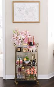 How To Style A Bar Cart Visions Of Vogue Living Room Corner Decor Candles Bar Cart Decor Bar Cart Styling Gold Bar Cart