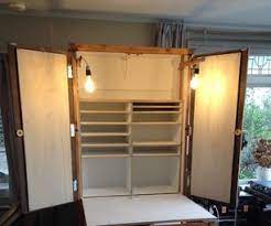 Cupboard With Folding Table And Lights Craft Table Diy Fold Down Table Diy Cupboards