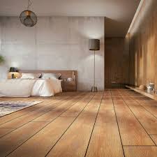 Solid parquet hardwood flooring can be glued directly to a concrete slab on grade or above grade with the use of a manufacturer recommended vapor retarder. Wood Floor Installation
