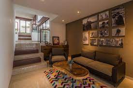 Jangan lupa untuk menjaga kebersihan cermin agar terlihat tetap cantik sebagai dekorasi dinding anda. Dekorasi Ruang Tamu Bergaya Minimalis Yang Memilih Aksen Kayu Pada Mejanya Portofolio B Residential Interior Design Interior Design Interior Design And Build