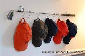 Ideas How To Organize Baseball Hats Google Search Golf Decor Golf Shop Golf Clubs