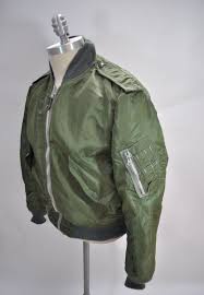 This classic bomber jacket features zippered utility pockets and pen pockets on the left arm, zippered front closure. Pin On Military