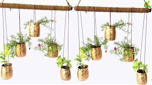Many types of decorative pieces can be prepared with the help of old bottles. Plastic Bottle Hanging Garden Bottle Garden Organic Garden Youtube