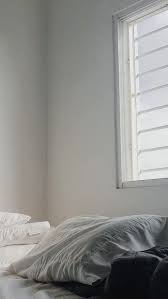 The white bedroom is laid out in unusual style, where the room has two beds. Pin By Aom Peeranat On White Aesthetic Minimalist Wallpaper Aesthetic Iphone Wallpaper Minimal Wallpaper