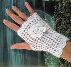 You'll love how easy these are to make and how great they are as a gift this. Wedding Bridal White Mittens Fingerless Gloves By Lilithcreation Crochet Gloves Pattern Fingerless Gloves Crochet Pattern Crochet Wrist Warmers