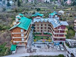 Built in a himalayan style with plenty of wooden influences, this boutique hotel offers chic accommodation with both rooms and apartments available. Hotel Snow Peak Retreat And Cottages Manali Complete Package Discover Kullu Manali