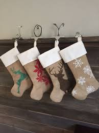 Diy Burlap Stockings With Christmas Silhouettes Painted On Bigger Designs And Darker Brighter Pa Christmas Stockings Diy Burlap Stockings Decorated Stockings