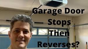 My garage door sometimes opens part way and then closes. Garage Door Opener Stops And Reverses Youtube