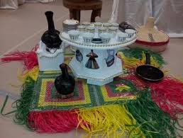 The dictionary defines it as a large wooden cup or bowl, a basin for washing the hands, or a large wooden table. Rekebot