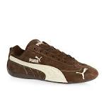 Brown puma trainers