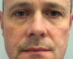 REST IN PEACE: Nathaniel Jones, 38, was identified as the bicyclist who was  struck and trapped beneath a car after the driver was shot. The car crashed  through the side of a