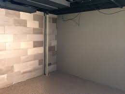 It's made to work on a range of masonry walls, concrete block, stucco or brick. Painted Cinder Block Basement Remodel Diy Cinder Block Walls Modern Kitchen Window