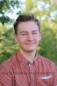 I've been photographing Nathan's family for quite a while now, and at the  risk of sounding like a broken record-- I can't believe we just took his  senior photos! Nathan knew what