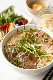 The hot broth will cook the thinly sliced sirloin). Authentic Vietnamese Beef Pho Noodle Soup Phá»Ÿ Bo Delightful Plate