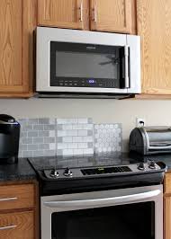 Peel and stick tiles have sticky coatings on their backs so you can easily apply them without using other adhesives, such as thinset. Peel And Stick Tiles For The Backsplash Tag Tibby Design