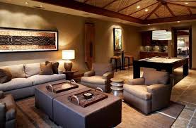 Here, surfboards make for a casual wall decoration that's also functional if you're an avid surfer. African Themed Living Rooms Beauty And Style Adorable Home