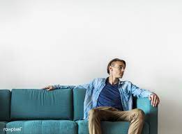 Young woman and older man using laptop together, looking at screen, sitting on couch at home, mature young man with attractive woman. Man Sitting On A Couch Free Image By Rawpixel Com Sitting Pose Reference Man Sitting Sitting Poses