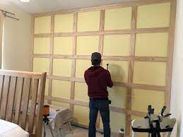 Wooden paneling can be used to emphasize the wall behind your bed , as shown in this space below featuring reclaimed wood salvaged from old barns in. How To Diy A Shaker Panel Accent Wall Construction2style