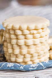 In a large bowl, combine the sugar, butter, cream cheese, salt, almond and vanilla extracts, and egg yolk. Cream Cheese Sugar Cookies Easy Cut Out Sugar Cookie With Frosting