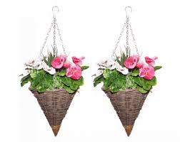 This geranium artificial plant features anthis geranium artificial plant features an abundant amount of vibrant red blooms and shiny green leaves that splay in different directions and spill out of the woven hanging basket. Artificial Hanging Baskets The Artificial Flowers Company