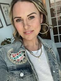 Anita's mismatched earrings and necklace colors