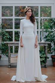 22 Bridal Designers For Fashion Brides Onefabday Com Cape Wedding Dress Wedding Dress Long Sleeve Unconventional Wedding Dress