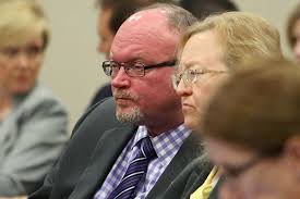 CFO's top attorney strikes back, says McCarty can remain as commissioner