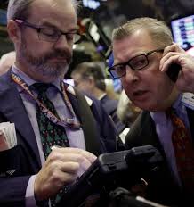 Wall Street slips from record high